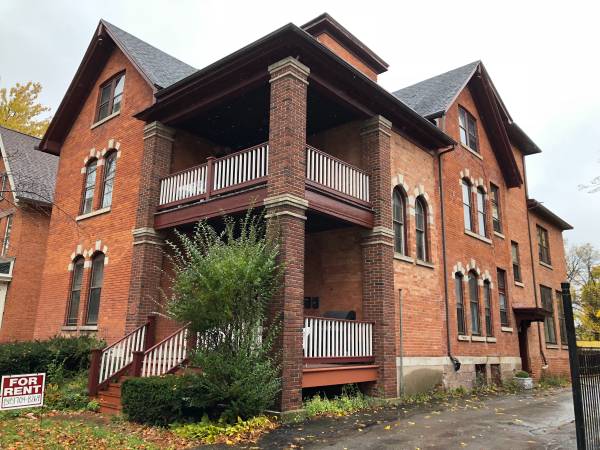 A two-story brick apartment building